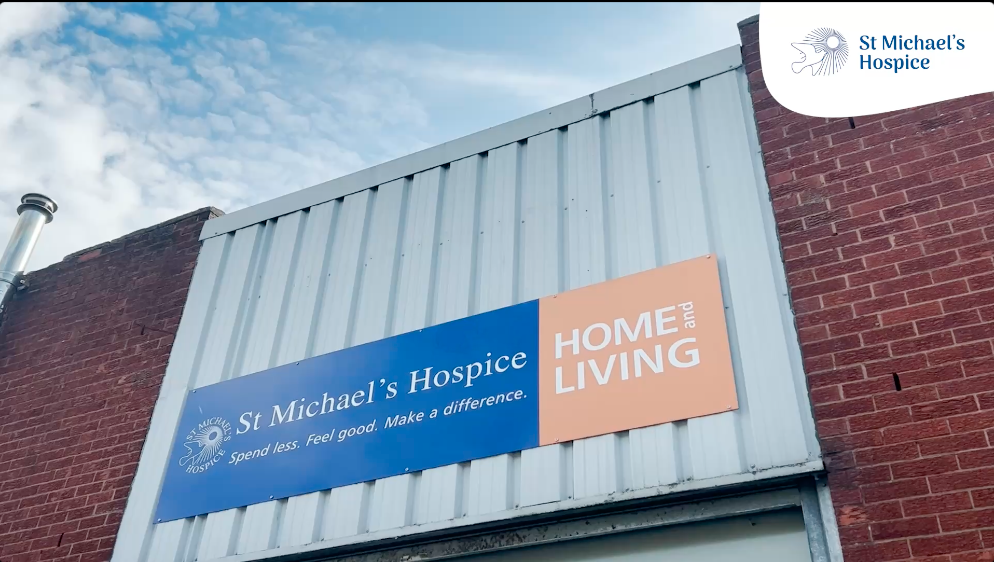 Image of the signage at the front of the Leominster Home & Living shop, with shop name and St Michael's Hospice logo