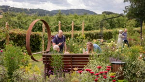 a family enjoying a summers day in the Hospice garden