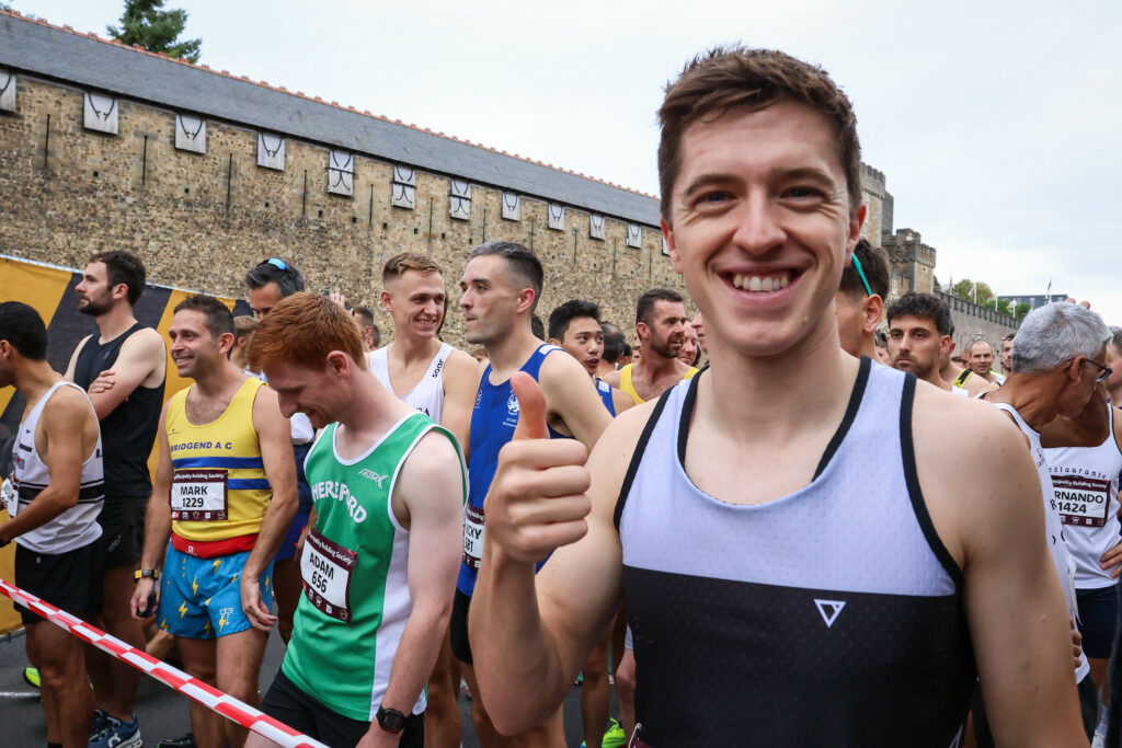 A runner giving the thumbs up