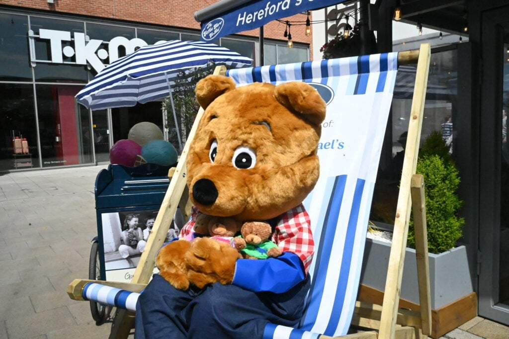 Benny Bear sat in a beach chair outside Coffee Cart