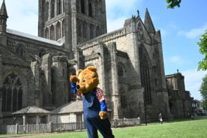 Benny Bear outside Hereford Cathedral searching for his Friends